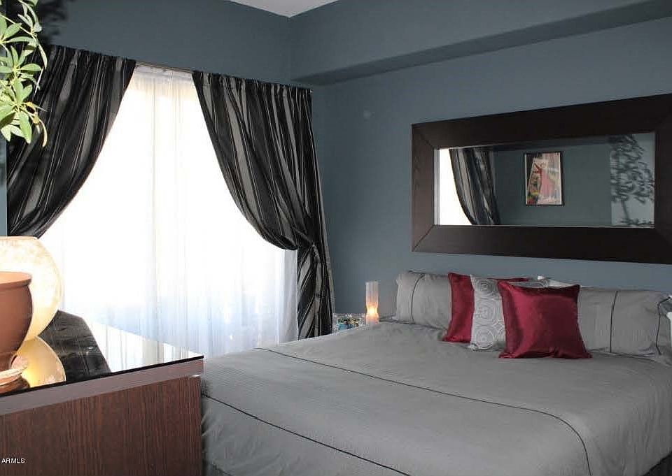 Bedroom with sliding door to balcony (bed, dresser & mirror as furnished by prior resident #1)