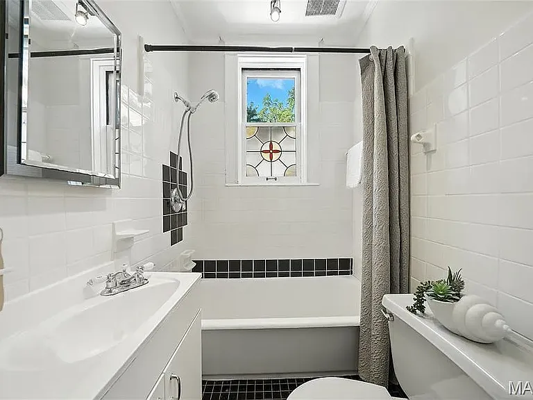 6109 McPherson Ave — Photo 19