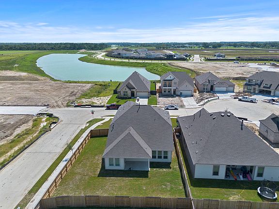 An additional view of your home, oversized corner lot and community.