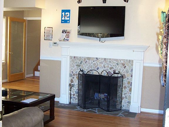 Living Room Firlplace and Hardwood Floor