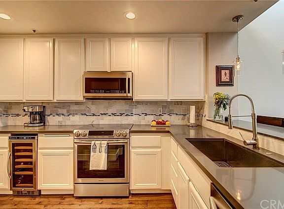 Amazing Kitchen has it all.. Acres of counter space and cabinet storage galore.