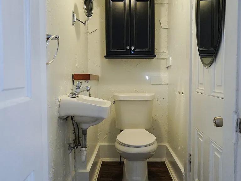 First floor half bath makes hosting easy.