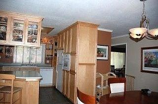 Kitchen, dining, and entry