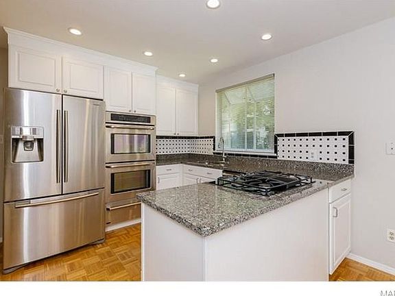 Kitchen with Granite Countertops and Double Oven