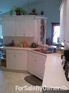 Kitchen : Double Basin sink with open view of living room