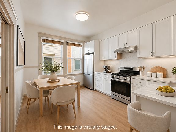 Large and airy kitchen with Peninsula and room for an eat-in kitchen table