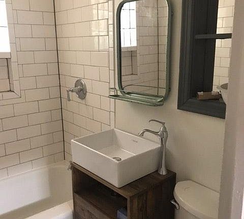bathroom sink and new shower tile