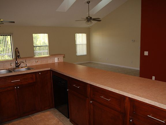 Cabinets open on both sides.