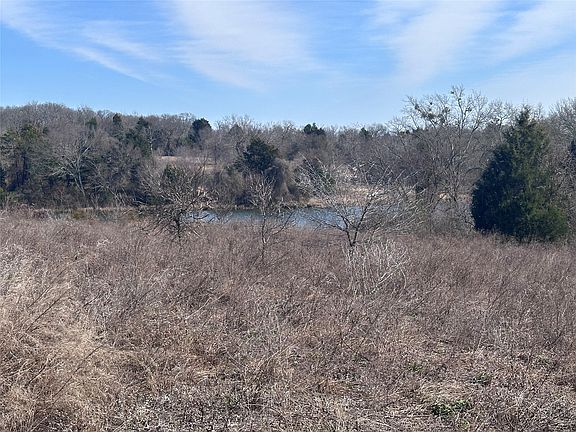 4th image of Wooded Creek Dr