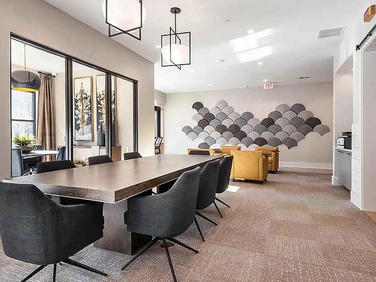 Community Workspace with Large Collaborative Tables and Lounge Area
