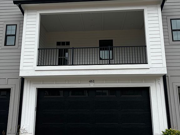 Private covered porch off the kitchen