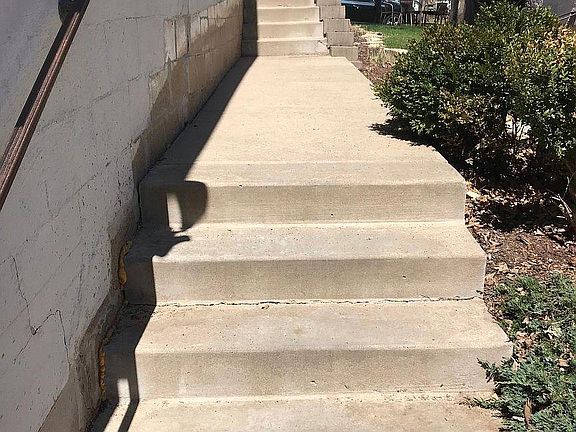 Sidewalk from driveway to lower level entrance