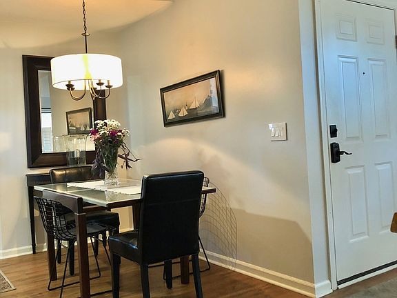 Dining area - seats 4 with extra 2 chairs added for larger group. 
Island seats 3 and console table seats 2.