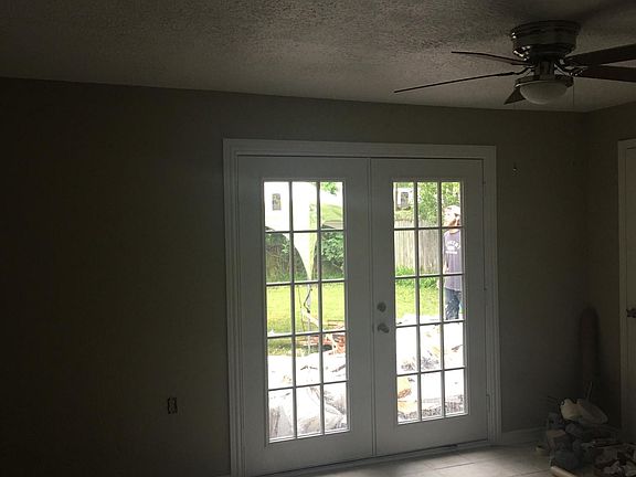 Spacious dining room with view to the backyard.