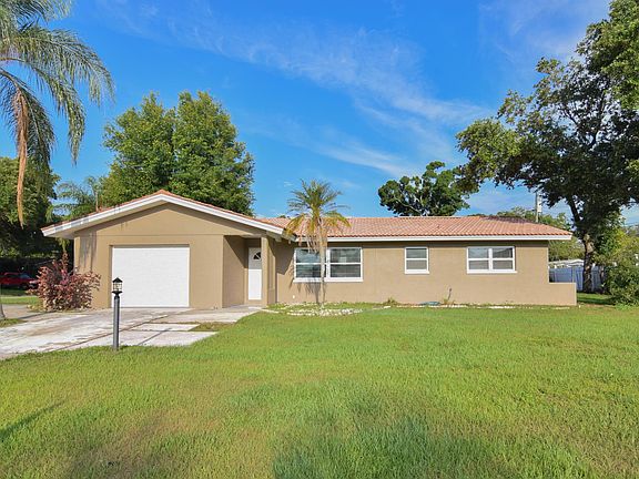 Front Exterior-Large Circular Driveway and 1-Car Garage