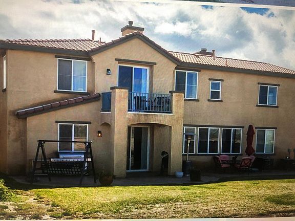 back of the house with 6ft wall boundaries.