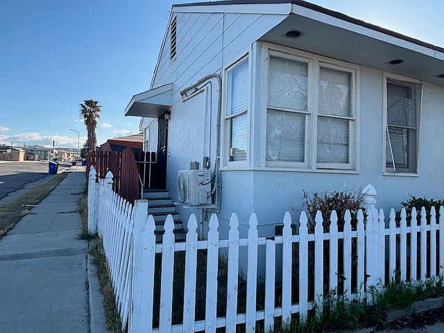 Exterior with fenced yard