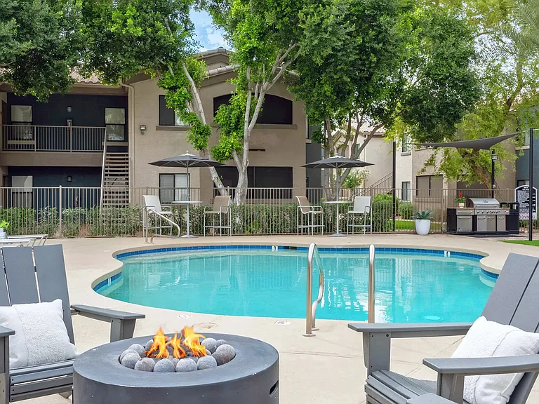 Unwind at the inviting community fire pit, where warmth and comfort combine.