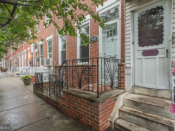 The home is located on a quiet, tree-lined street with friendly neighbors, creating a welcoming and community-oriented atmosphere. The block offers a convenient location with easy access to public transportation, making commuting simple.