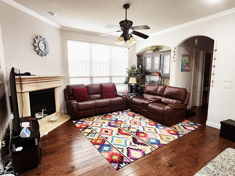Living room with Fireplace and dry bar counter