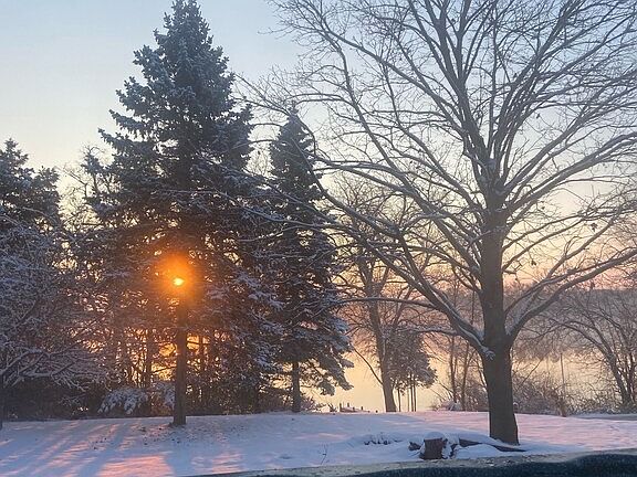 Sunrise from the hot tub in winter