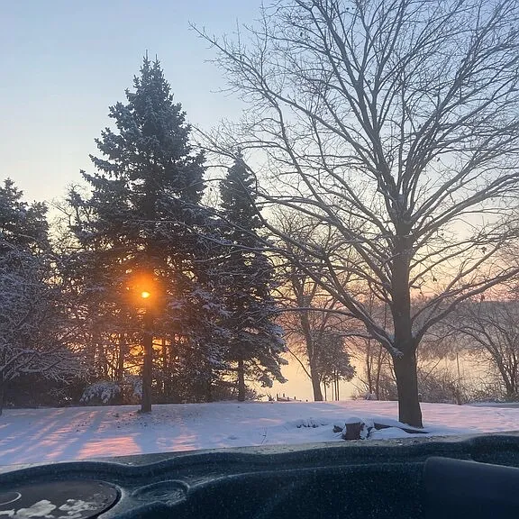 Sunrise from the hot tub in winter