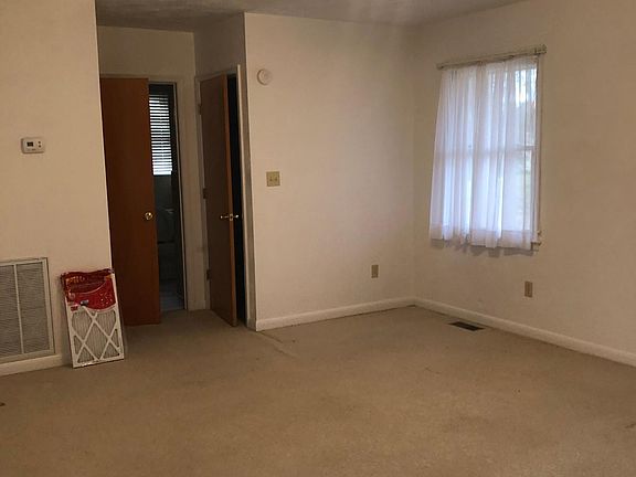 Master bedroom with two walk-in closets and restroom.