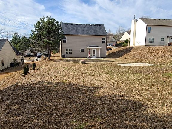 Back of the Property + Backyard