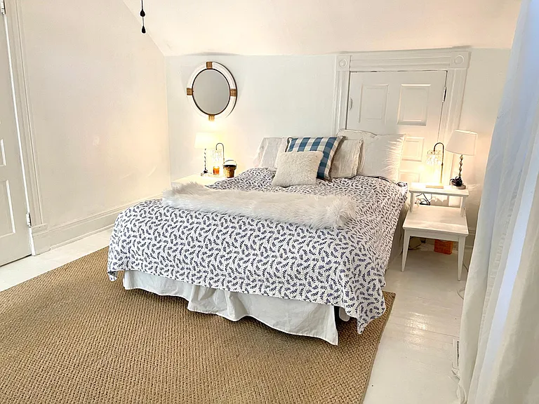 One of the bedrooms on the second floor