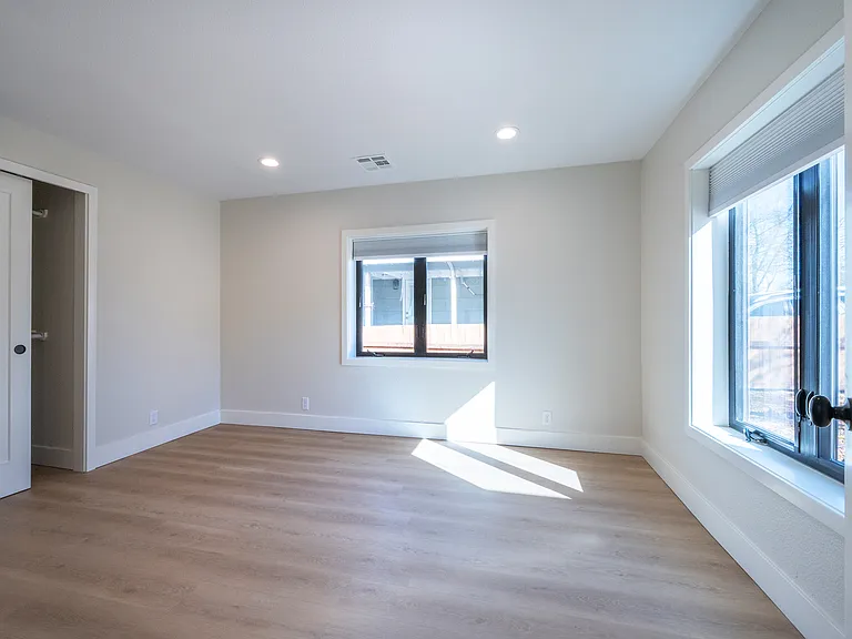 Bedroom #3 
2 large windows and closet organizers.