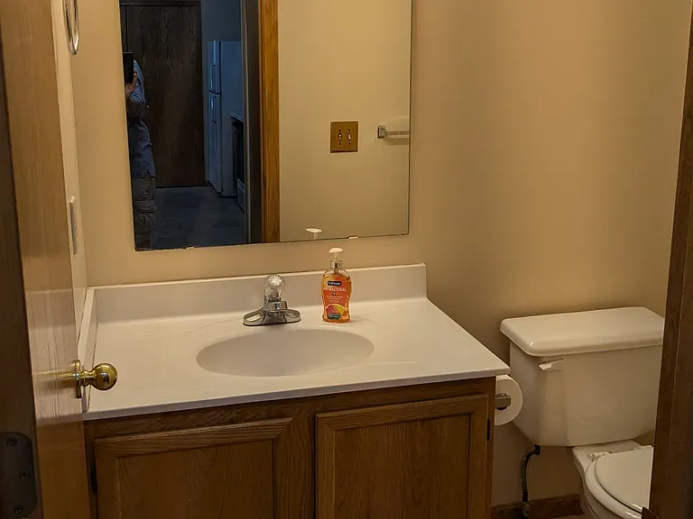The half bathroom off the kitchen on the main floor