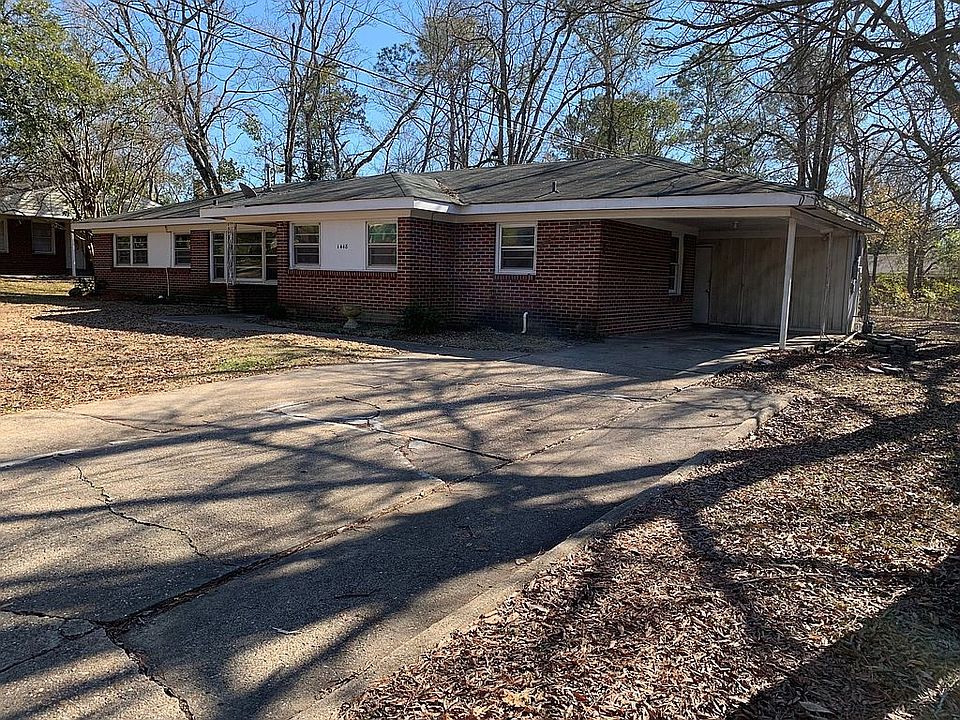 Front yard with carport