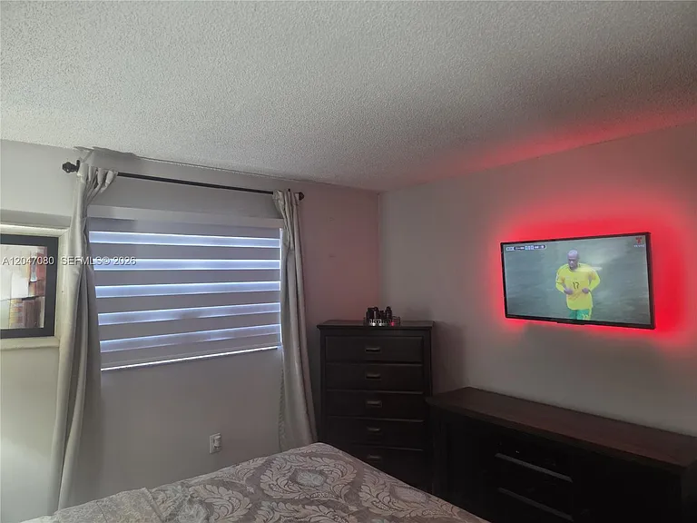 4265 NW South Tamiami Canal Dr #1-208 — Photo 15