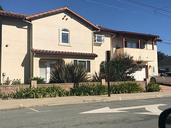 Your studio is on the right hand side, balcony overlooking the street, parking spot on the side.