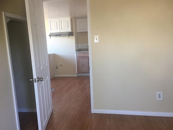 Bedroom with kitchen view