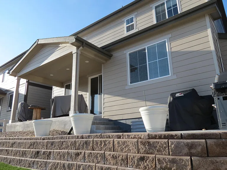 Side patio for grills or plants