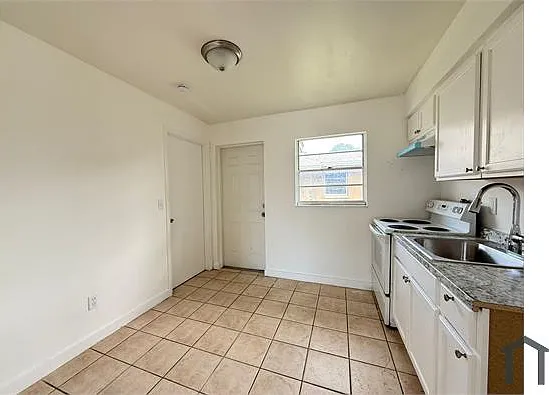 1703 Palm Dr — Photo 4