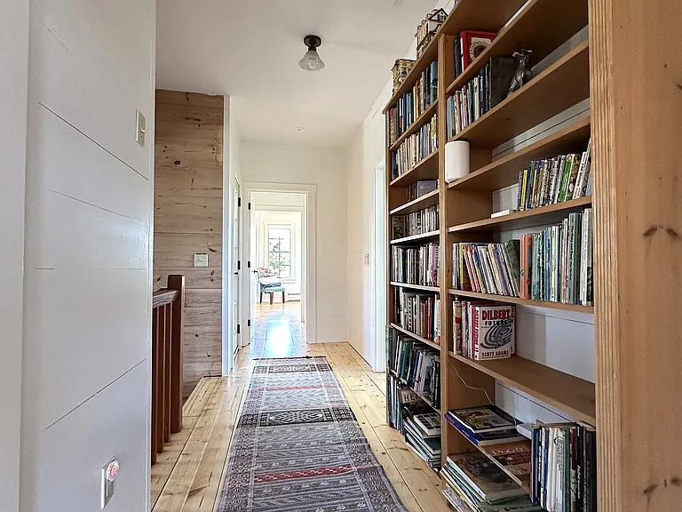 Upstairs hall with books for all ages and tons of DVDs