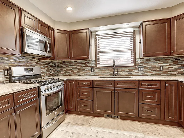 10563 W 62nd Pl — Photo 12