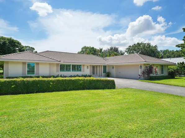 408 S Country Club Dr, Atlantis, FL 33462