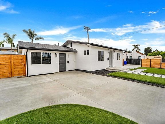 Front view of ADU attached to main home. Driveway for off-street parking.