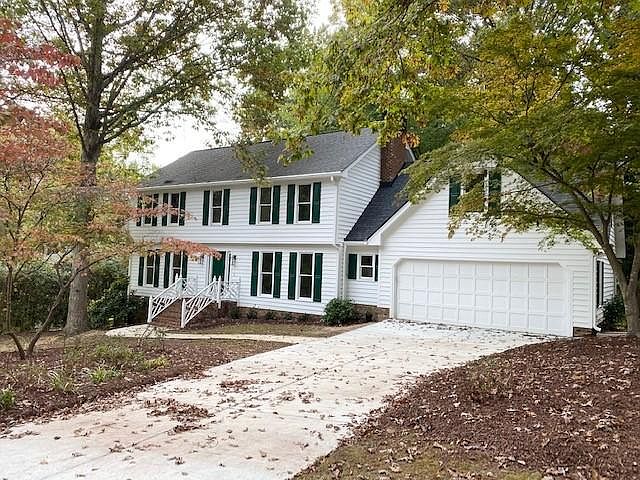 Exterior of home on .43 Acre lot in established older neighborhood can't convey the fully redone 2021 interior