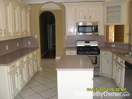 Kitchen
						:
						Island has drawers and cabinets for more storage.