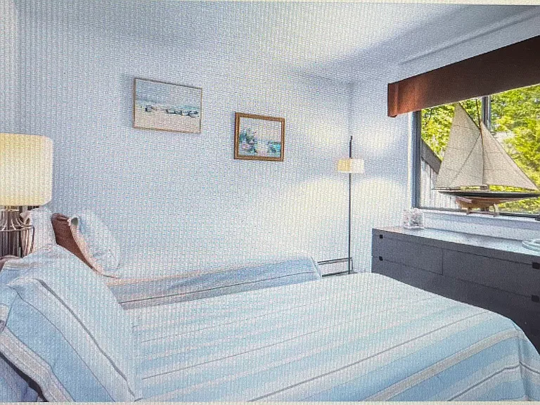 Twin beds in one of first floor bedrooms