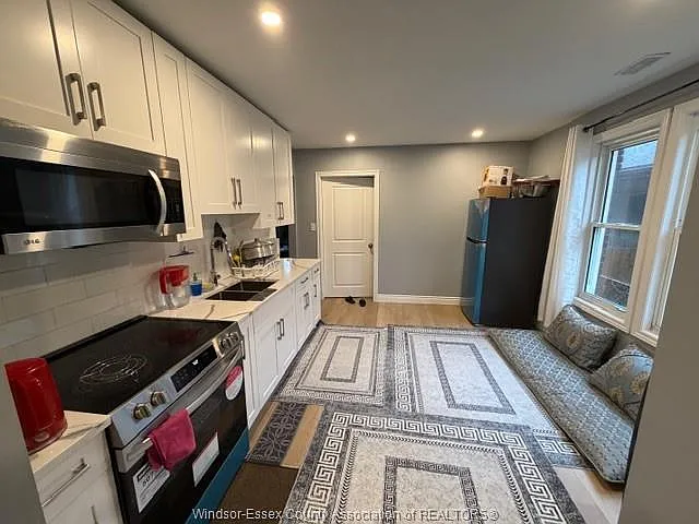 25 Giles Blvd E #MAIN LEVEL — Photo 7