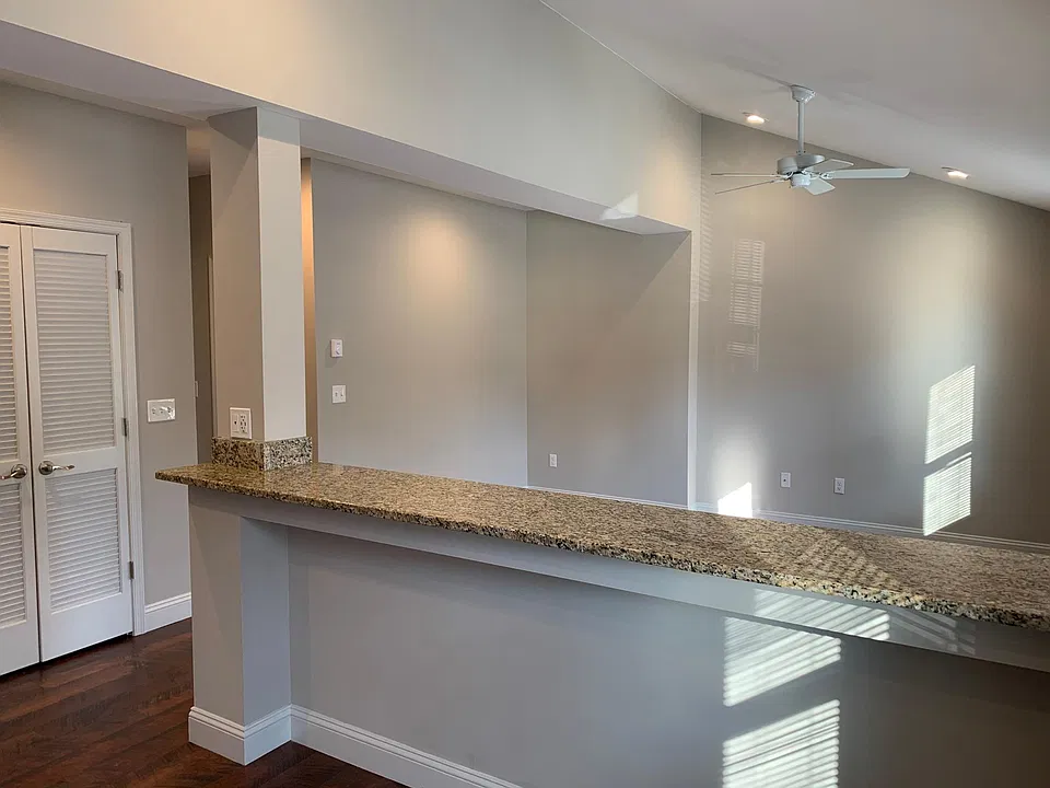 Kitchen looking into living room