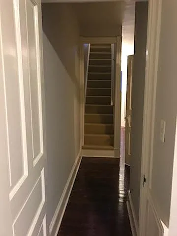 View of stairs to 3rd floor from 3rd bedroom