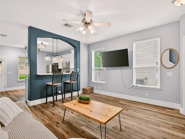 Open living room layout; Flat screen TV included