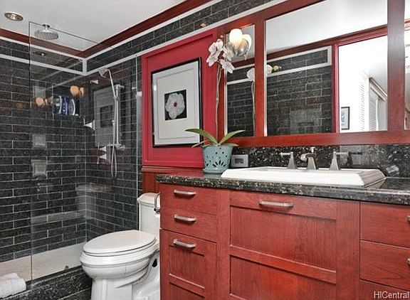Totally re-designed custom bath w/granite, cabs and tiles.