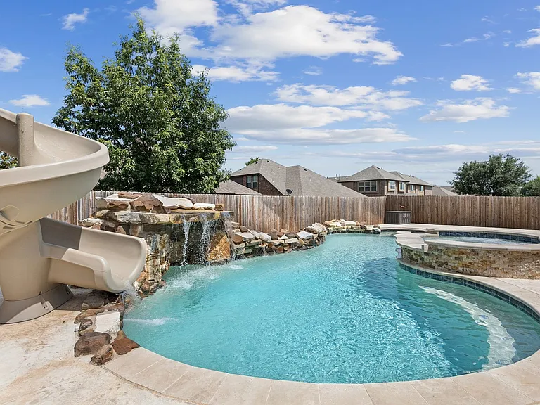 Resort Style Pool with Slide, Grotto, Spa, Tequila Table